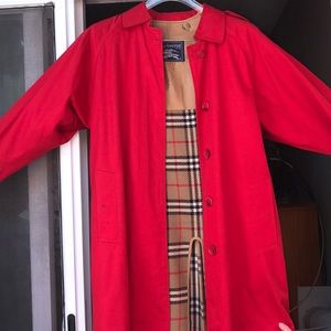 Red Burberry (previously Burberry’s) trench coat